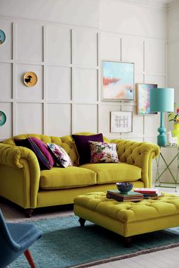 Joules Windsor three-seater sofa in yellow velvet, available exclusively at DFS