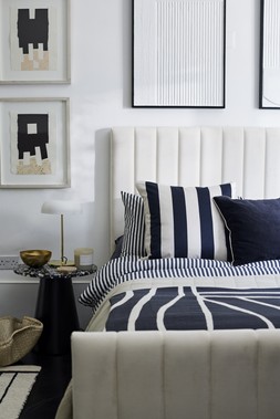 DFS Bryony King Size Ottoman Bed Frame in Cream Velvet, Dwell Lerato Artwork, available at DFS